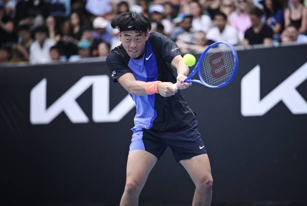 (260115) -- MELBOURNE, Jan. 15, 2026 -- Coleman Wong of China s Hong Kong hits a return during the men s singles qualifying final round match against Elias Ymer of Sweden at Australian Open tennis tournament in Melbourne, Australia, Jan. 15, 2026. (Photo by Xinhua) (SP)AUSTRALIA-MELBOURNE-TENNIS-AUSTRALIAN OPEN-MEN S SINGLES-QUALIFYING WangxShen 
