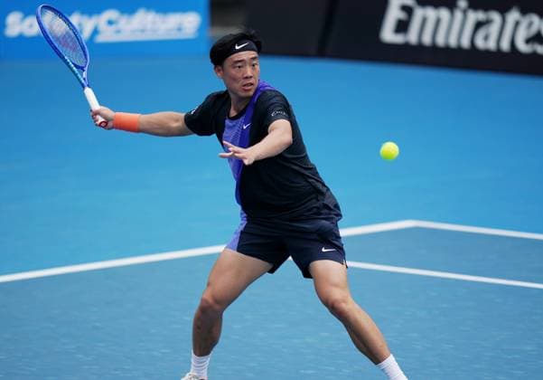 (260115) -- MELBOURNE, Jan. 15, 2026 -- Coleman Wong of China s Hong Kong hits a return during the men s singles qualifying final round match against Elias Ymer of Sweden at Australian Open tennis tournament in Melbourne, Australia, Jan. 15, 2026. (Photo by Xinhua) (SP)AUSTRALIA-MELBOURNE-TENNIS-AUSTRALIAN OPEN-MEN S SINGLES-QUALIFYING WangxShen 