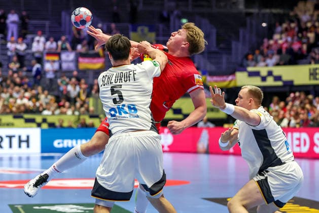 15 01 2026, Handball, Men s EHF EURO 2026, Germany Austria, Jyske Bank Boxing in Herning, Denmark, Preliminary Round Lukas Hutecek Austria 72 in a duel against Miro Schluroff Germany 05 Justus Fischer Germany 54 Denmark