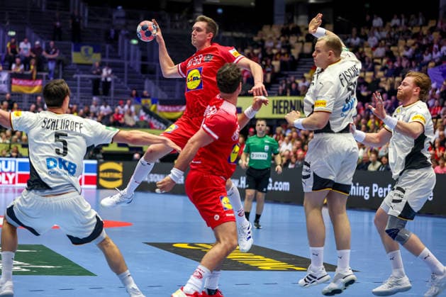 15 01 2026, Handball, Men s EHF EURO 2026, Germany Austria, Jyske Bank Boxing in Herning, Denmark, Preliminary Round Mykola Bilyk Austria 53 in a duel against Miro Schluroff Germany 05 Justus Fischer Germany 54 Tom Kiesler Germany 30 Denmark