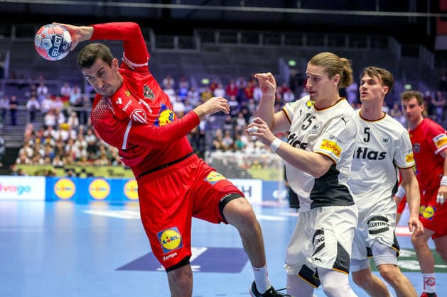 15 01 2026, Handball, Men s EHF EURO 2026, Germany Austria, Jyske Bank Boxing in Herning, Denmark, Preliminary Round Janko Bozovic Austria 07 vs Juri Knorr Germany 15 Miro Schluroff Germany 05 Denmark