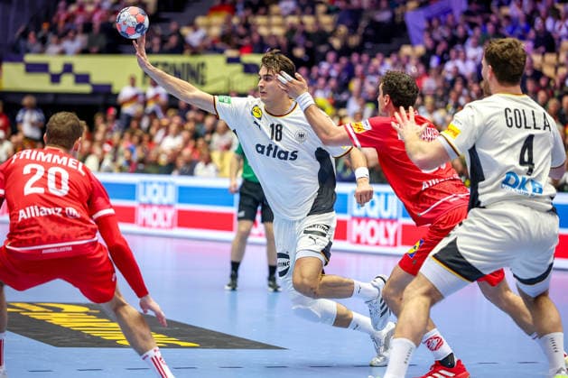 15 01 2026, Handball, Men s EHF EURO 2026, Germany Austria, Jyske Bank Boxing in Herning, Denmark, Preliminary Round Julian Köster Germany 18 in a duel against Sebastian Frimmel Austria 20 Elias Kofler Austria 66 Denmark