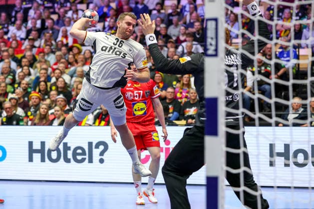 15 01 2026, Handball, Men s EHF EURO 2026, Germany Austria, Jyske Bank Boxen in Herning, Denmark, Preliminary Round Lukas Mertens Germany 36 throws on the goal of Leon Theodor Bergmann Austria 51 Denmark