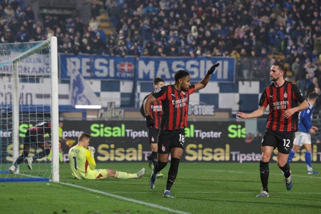 Como, Italy, 15th January 2026. Christopher Nkunku of AC Milan celebrates with team mate Adrien Rabiot after scoring a first half penalty to level things at 1-1 during the Como 1907 vs AC Milan Serie A match at Stadio Giuseppe Sinigaglia, Como. Picture credit should read: Jonathan Moscrop Sportimage EDITORIAL USE ONLY. No use with unauthorised audio, video, data, fixture lists, club league logos or live services. Online in-match use limited to 120 images, no video emulation. No use in betting, games or single club league player publications. SPI_030_JM_COMO_MILAN_ SPI-4414-0030