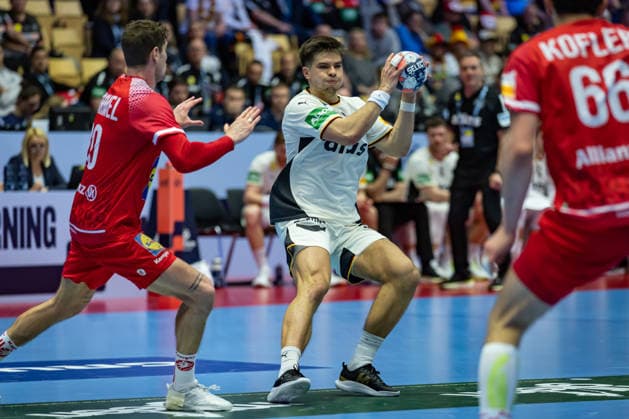 HERNING, DENMARK - JANUARY 15: Renars Uscins (Germany, 23) in attack during the EHF EURO 2026 match between Germany vs Austria at Jyske Bank Boxen Arena on matchday 1 of the Group Matches Group A on January 15, 2026 in Herning, Denmark. Midtjylland Denmark Copyright: xMarioxM.xKobergx
