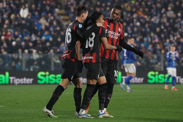 Como, Italy, 15th January 2026. Christopher Nkunku of AC Milan celebrates with team mates scoring a first half penalty to level things at 1-1 during the Como 1907 vs AC Milan Serie A match at Stadio Giuseppe Sinigaglia, Como. Picture credit should read: Jonathan Moscrop Sportimage EDITORIAL USE ONLY. No use with unauthorised audio, video, data, fixture lists, club league logos or live services. Online in-match use limited to 120 images, no video emulation. No use in betting, games or single club league player publications. SPI_032_JM_COMO_MILAN_ SPI-4414-0032