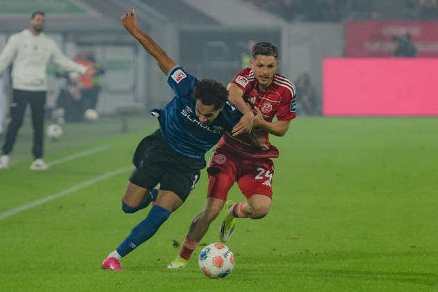 from left in duel Monju Momuluh Bielefeld 14 Daniel Svensson Dortmund 24 16 01 2026 Soccer Fortuna Duesseldorf vs DSC Arminia Bielefeld, Merkur Spiel Arena, Duesseldorf, DFB DFL REGULATIONS PROHIBIT ANY USE OF PHOTOGRAPHS AS IMAGE SEQUENCES AND OR QUASI VIDE Copyright: xpepphotox xHorstxMauelshagenx pep00321, pep_20260116_hm_252643