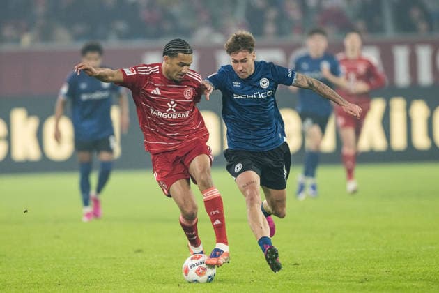 2 Soccer Bundesliga Fortuna Düsseldorf 1895 DSC Arminia Bielefeld 16 01 2026 duel Kenneth Schmidt Fortuna Düsseldorf, 4 , Joel Grodowski DSC Arminia Bielefeld, 11 2 Soccer Bundesliga, Fortuna Düsseldorf 1895 DSC Arminia Bielefeld, Düsseldorf, Merkur Spiel Arena on 16 01 2026 DFL REGULATIONS PROHIBIT ANY USE OF PHOTOGRAPHS AS IMAGE SEQUENCES AND OR QUASI VIDEO Copyright: xBEAUTIFULxSPORTS Wunderlx