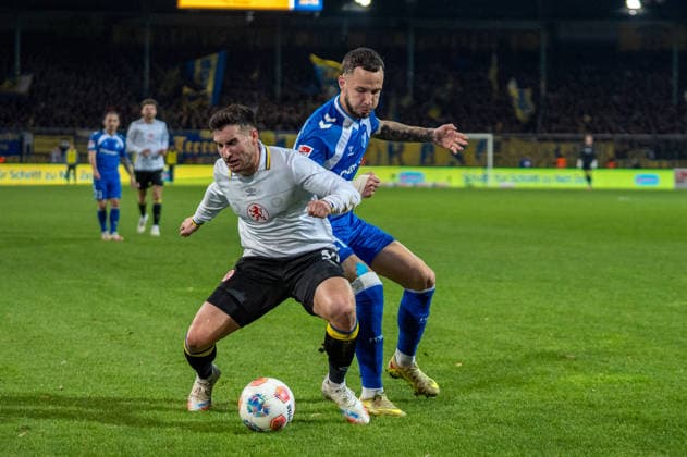 Germany, Soccer, 2 Bundesliga, Eintracht Braunschweig 1 FC Magdeburg on 16 01 in Braunschweig Eintracht Stadion Robin Heußer Eintracht Braunschweig 30 Falko Michel 1 FC Magdeburg 21 Copyright: xSvenxHeidmannx