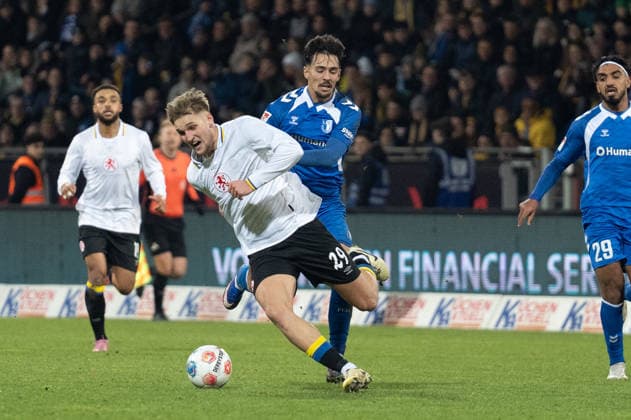 Germany, Soccer, 2 Bundesliga, Eintracht Braunschweig 1 FC Magdeburg on 16 01 in Braunschweig Eintracht Stadion Lukas Frenkert Eintracht Braunschweig 29 and Laurin Ulrich 1 FC Magdeburg 8 Copyright: xSvenxHeidmannx