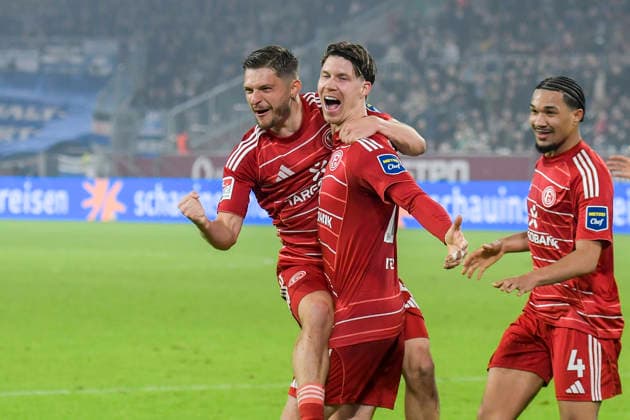 Cedric Itten Duesseldorf 13 celebrates after scoring the 1 0 goal with Florent Muslija Duesseldorf 24 Kenneth Schmidt Duesseldorf 4 16 01 2026 Soccer Fortuna Duesseldorf vs DSC Arminia Bielefeld, Merkur Spiel Arena, Duesseldorf, DFB DFL REGULATIONS PROHIBIT ANY USE OF PHOTOGRAPHS AS IMAGE SEQUENCES AND OR QUASI VIDEO Copyright: xpepphotox xHorstxMauelshagenx pep00321, pep_20260116_hm_253190