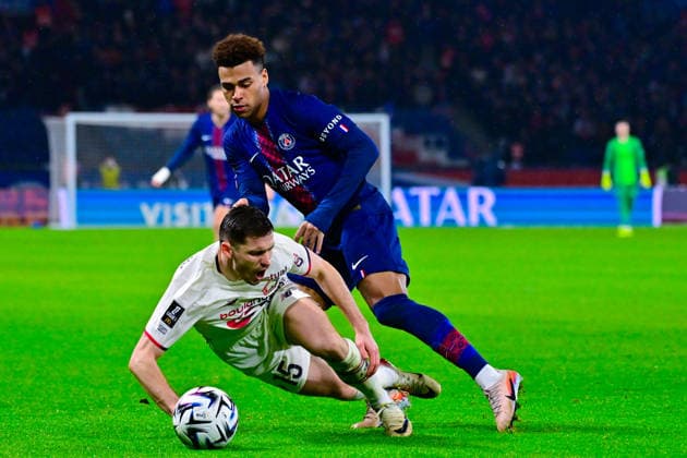 FOOTBALL : PSG vs Lille - Ligue1 - 16 01 2026 Desire Doue ( 14 - PSG ) and Romain Perraud ( 15 - Lille ) during the Ligue 1 match between Paris Saint Germain and Lille OSC at Parc Des Princes on January 16 , 2026 in Paris, France. ( Photo by Federico Pestelini PsnewZ ) - ParisFrance  Copyright: xFedericoxPestelinix