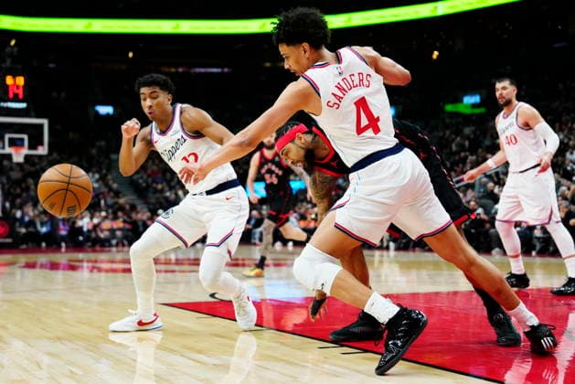 January 16, 2026, Toronto, On, Canada: Toronto Raptors Brandon Ingram (centre) is stripped of the ball by Los Angeles Clippers Kobe Sanders (4) and Cam Christie (12) during second half NBA, Basketball Herren, USA basketball action in Toronto on Friday, Jan. 16, 2026. Canada News - January 16, 2026  - ZUMAc35_ 20260116_zaf_c35_089 Copyright: xFrankxGunnx
