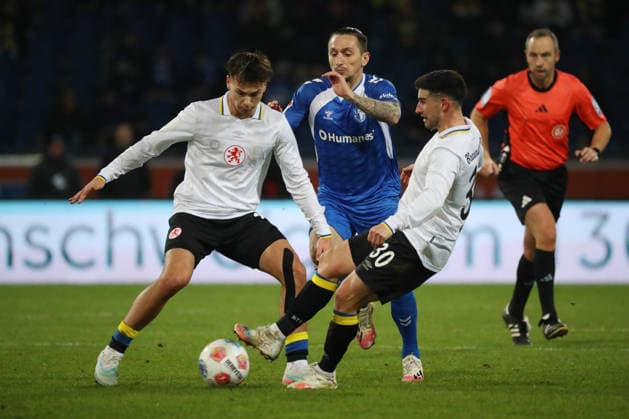 Braunschweig vs Magdeburg, 2 BL Braunschweig, 16 01 2026, Football, Men, 2 BL, Season 2025 2026, Eintracht Braunschweig vs 1 FC Magdeburg Max Marie Eintracht Braunschweig , Baris Atik Magdeburg , Robin Heußer Eintracht Braunschweig DFL DFB REGULATIONS PROHIBIT ANY USE OF PHOTOGRAPHS as IMAGE SEQUENCES and or QUASI VIDEO Stadion an der Hamburger Straße Niedersachsen Germany