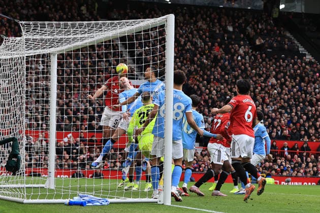 17th January 2026; Old Trafford, Manchester, England; Premier League Football, Manchester United, ManU versus Manchester City; Harry Maguire of Manchester United strikes the crossbar with a close range header  DavidxBlunsden