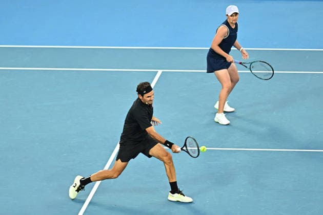 Opening Night at the 2026 Australian Open - Melbourne Roger Federer (SUI) with Ashley Barty (AUS) during the Opening Night at the 2026 Australian Open at Melbourne Park in Melbourne, AUSTRALIA, on January 17, 2026. Photo by Corinne Dubreuil ABACAPRESS.COM Melbourne Australia  Copyright: xDubreuilxCorinne ABACAx