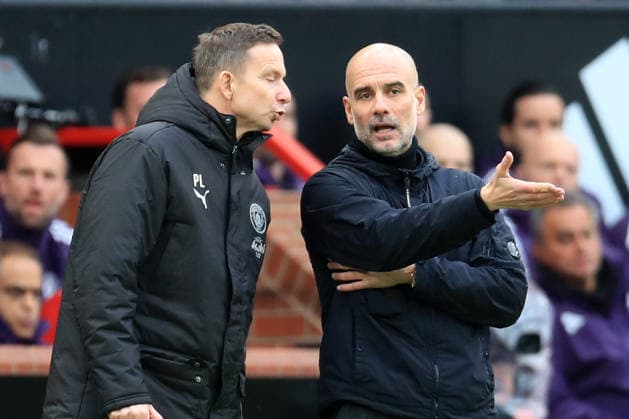 17th January 2026; Old Trafford, Manchester, England; Premier League Football, Manchester United, ManU versus Manchester City; Manchester City manager Pep Guardiola speaks with his assistant Pep Lijnders  DavidxBlunsden