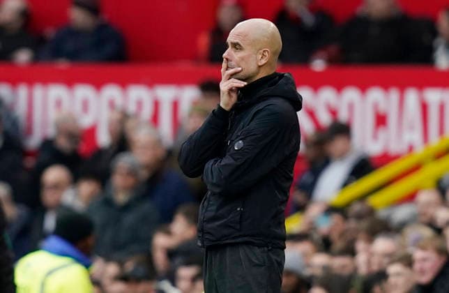 Manchester, England, 17th January 2026. Despondent Pep Guardiola coach of Manchester City during the Manchester United, ManU vs Manchester City Premier League match at Old Trafford, Manchester. Picture credit should read: Andrew Yates Sportimage EDITORIAL USE ONLY. No use with unauthorised audio, video, data, fixture lists, club league logos or live services. Online in-match use limited to 120 images, no video emulation. No use in betting, games or single club league player publications. SPI_111_AY_ManUtd_ManCity SPI-4456-0110