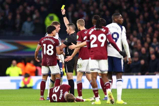 Micky van de Ven of Tottenham Hotspur is shown a yellow card Jarred Gillett match referee Tottenham Hotspur v West Ham United, Premier League, Football, Tottenham Hotspur Stadium, London, UK - 17 Jan 2026London Tottenham Hotspur Stadium United Kingdom EDITORIAL USE ONLY No use with unauthorised audio, video, data, fixture lists, club league logos or live services. Online in-match use limited to 120 images, no video emulation. No use in betting, games or single club league player publications. Copyright: xSimonxDael Shutterstockx 16348134ax