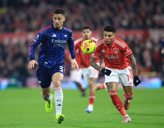 Nottingham, England, 17th January 2026. William Saliba of Arsenal under pressure from Igor Jesus of Nottingham Forest during the Nottingham Forest vs Arsenal Premier League match at the City Ground, Nottingham. Picture credit should read: Jessica Hornby Sportimage EDITORIAL USE ONLY. No use with unauthorised audio, video, data, fixture lists, club league logos or live services. Online in-match use limited to 120 images, no video emulation. No use in betting, games or single club league player publications. SPI_025_JH_FOREST_ARSENAL SPI-4459-0025