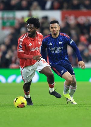 Nottingham, England, 17th January 2026. Ola Aina of Nottingham Forest dispossess Gabriel Jesus of Arsenal during the Nottingham Forest vs Arsenal Premier League match at the City Ground, Nottingham. Picture credit should read: Jessica Hornby Sportimage EDITORIAL USE ONLY. No use with unauthorised audio, video, data, fixture lists, club league logos or live services. Online in-match use limited to 120 images, no video emulation. No use in betting, games or single club league player publications. SPI_053_JH_FOREST_ARSENAL SPI-4459-0053