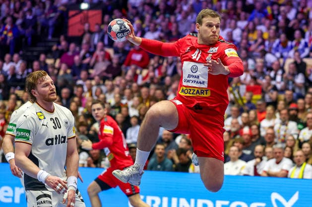 17 01 2026, Handball, Men s EHF EURO 2026, Germany Serbia, Jyske Bank Boxen in Herning, Denmark, Preliminary Round xs41 throws the ball at the goal of David Späth Germany 01 Denmark