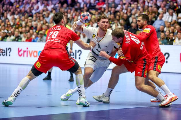 17 01 2026, Handball, Men s EHF EURO 2026, Germany Serbia, Jyske Bank Boxing in Herning, Denmark, Preliminary Round Johannes Golla Germany 04 in duel against Marko Tasic Serbia 29 Dragan Pechmalbec Serbia 46 Denmark