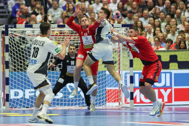 Serbia Germany, EHF Handball European Championship 2026 Renars Uscins Germany 23 is defended by Dragan Pechmalbec Serbia, 46 Left Julian Köster Germany, 18 Handball EHF European Championship, international match between Serbia and Germany on January 17, 2026 in Herning Denmark , Herning Denmark Jyske Bank Boxing