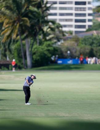 January 17, 2026, Honolulu, Hawaii, USA: JOE HIGHSMITH makes an approach shot from the 9th fairway during Round 3 of the 2026 Sony Open in Honolulu, Hawaii on January 17, 2026. Honolulu USA - ZUMAm310 20260117_zsp_m310_095 Copyright: xElliotxMilesx