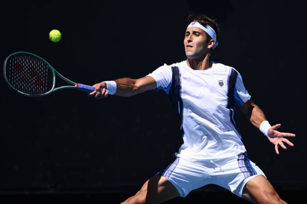 TENNIS AUSTRALIAN OPEN, Tomas Martin Etcheverry of Argentina in action during the Men™s 1st round match against Miomir Kecmanovic of Serbia on day 1 of the 2026 Australian Open tennis tournament at Melbourne Park in Melbourne, Sunday, January 18, 2026. ( NO ARCHIVING MELBOURNE VICTORIA AUSTRALIA  Copyright: xJOELxCARRETTx 20260118121226351365