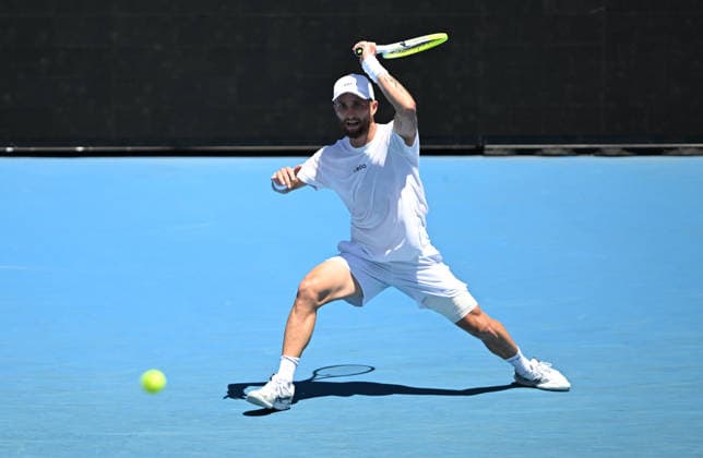 TENNIS AUSTRALIAN OPEN, Corentin Moutet of France in action during the Men™s 1st round match against Tristan Schoolkate of Australia on day 1 of the 2026 Australian Open tennis tournament at Melbourne Park in Melbourne, Wednesday, January 14, 2026. ( NO ARCHIVING MELBOURNE VICTORIA AUSTRALIA  Copyright: xLUKASxCOCHx 20260118186753288853