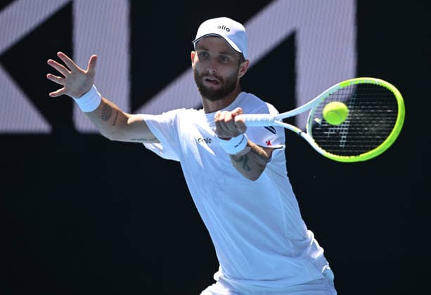 TENNIS AUSTRALIAN OPEN, Corentin Moutet of France returns during the Men™s 1st round match against Tristan Schoolkate of Australia on day 1 of the 2026 Australian Open tennis tournament at Melbourne Park in Melbourne, Wednesday, January 14, 2026. ( NO ARCHIVING MELBOURNE VICTORIA AUSTRALIA  Copyright: xLUKASxCOCHx 20260118158857082937