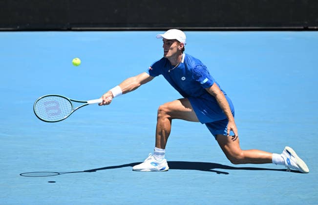 TENNIS AUSTRALIAN OPEN, Tristan Schoolkate of Australia in action during the Men™s 1st round match against Corentin Moutet of France on day 1 of the 2026 Australian Open tennis tournament at Melbourne Park in Melbourne, Wednesday, January 14, 2026. ( NO ARCHIVING MELBOURNE VICTORIA AUSTRALIA  Copyright: xLUKASxCOCHx 20260118120947907568
