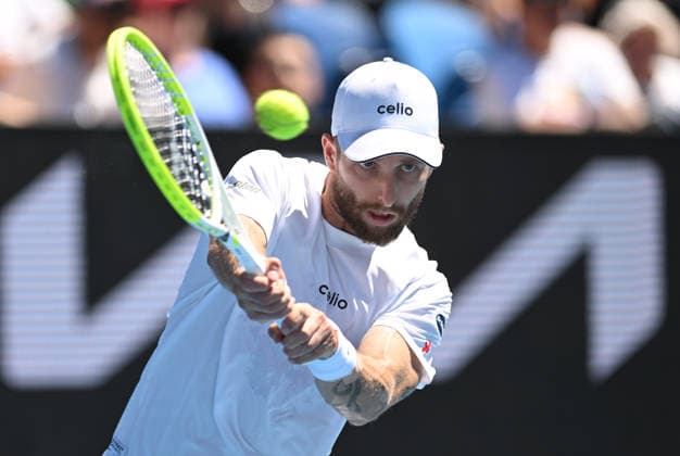 TENNIS AUSTRALIAN OPEN, Corentin Moutet of France in action during the Men™s 1st round match against Tristan Schoolkate of Australia on day 1 of the 2026 Australian Open tennis tournament at Melbourne Park in Melbourne, Wednesday, January 14, 2026. ( NO ARCHIVING MELBOURNE VICTORIA AUSTRALIA  Copyright: xLUKASxCOCHx 20260118179227708093