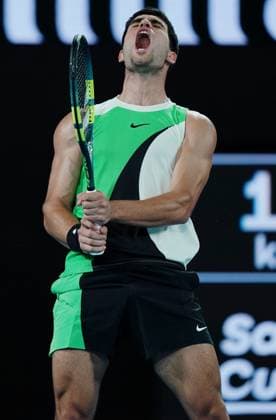 (260118) -- MELBOURNE, Jan. 18, 2026 -- Carlos Alcaraz of Spain celebrates scoring during the men s singles 1st round match between Carlos Alcaraz of Spain and Adam Walton of Australia at the Australian Open tennis tournament in Melbourne, Australia, Jan. 18, 2026. (Photo by Xinhua) (SP)AUSTRALIA-MELBOURNE-TENNIS-AUSTRALIAN OPEN-MEN S SINGLES WangxShen 