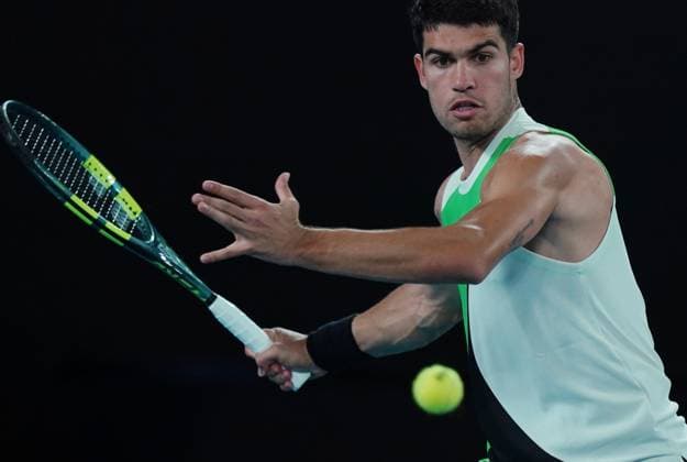 (260118) -- MELBOURNE, Jan. 18, 2026 -- Carlos Alcaraz of Spain hits a return during the men s singles 1st round match between Carlos Alcaraz of Spain and Adam Walton of Australia at the Australian Open tennis tournament in Melbourne, Australia, Jan. 18, 2026. (Photo by Xinhua) (SP)AUSTRALIA-MELBOURNE-TENNIS-AUSTRALIAN OPEN-MEN S SINGLES WangxShen 