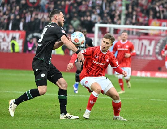 Football 2 Bundesliga Season 2025 26 1 FC Kaiserslautern 18 02 2026 Fritz Walter Stadion 1 FC Kaiserslautern fck Hannover 96 h Handball by Boris TOMIAK Hannover 96 , left Naatan SKYTTAE 1 FC Kaiserslautern , right 1 FC Kaiserslautern