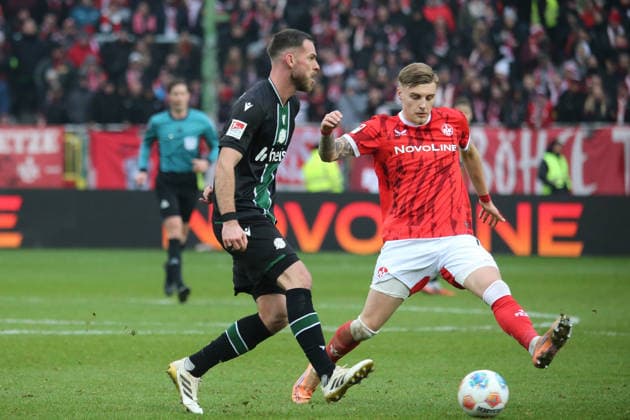 2 Bundesliga 1 FC Kaiserslautern Hannover 96 on 18 01 2026 at Fritz Walter Stadium in Kaiserslautern Boris Tomiak Hannover 96 Norman Bassette 1 FC Kaiserslautern duel, action, action, battle for the ball SM