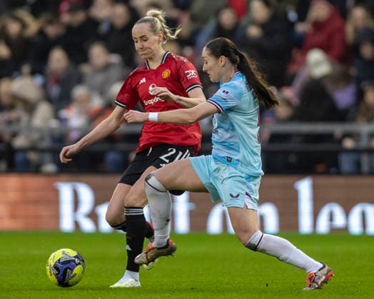 18th January 2026; Leigh Sports Village, Manchester, England; Womens FA Cup Football, Manchester United, ManU versus Burnley; Anna Sandberg of Manchester United Women is tackled by Claudia Walker of Burnley Women  TimxWilliams Content restricted for UK based newspaper