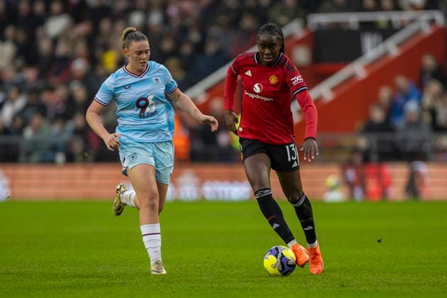 18th January 2026; Leigh Sports Village, Manchester, England; Womens FA Cup Football, Manchester United, ManU versus Burnley; Simi Awujo of Manchester United Women under pressure from Millie Ravening of Burnley Women  TimxWilliams Content restricted for UK based newspaper