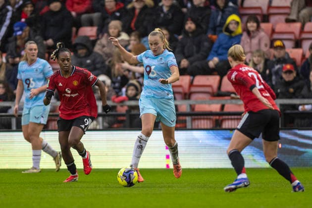 18th January 2026; Leigh Sports Village, Manchester, England; Womens FA Cup Football, Manchester United, ManU versus Burnley; Emma Siddall of Burnley Women under pressure from Anna Sandberg of Manchester United Women  TimxWilliams Content restricted for UK based newspaper