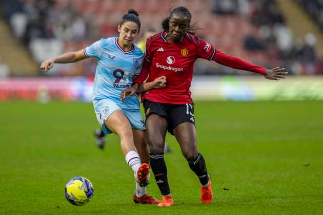 18th January 2026; Leigh Sports Village, Manchester, England; Womens FA Cup Football, Manchester United, ManU versus Burnley; Simi Awujo of Manchester United Women is tackled by Millie Chandarana of Burnley Women  TimxWilliams Content restricted for UK based newspaper
