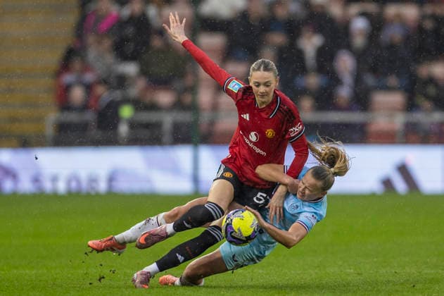 18th January 2026; Leigh Sports Village, Manchester, England; Womens FA Cup Football, Manchester United, ManU versus Burnley; Layla Drury of Manchester United Women is tackled  TimxWilliams Content restricted for UK based newspaper