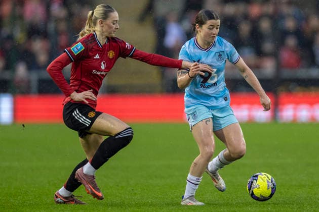 18th January 2026; Leigh Sports Village, Manchester, England; Womens FA Cup Football, Manchester United, ManU versus Burnley; Charlie Docherty of Burnley Women under pressure from Layla Drury of Manchester United Women  TimxWilliams Content restricted for UK based newspaper