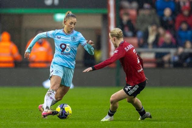18th January 2026; Leigh Sports Village, Manchester, England; Womens FA Cup Football, Manchester United, ManU versus Burnley; Brenna McPartlan of Burnley Women under pressure from Anna Sandberg of Manchester United Women  TimxWilliams Content restricted for UK based newspaper