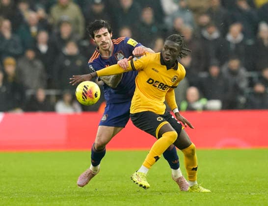 Wolverhampton, England, 18th January 2026. Sandro Tonali of Newcastle United (l) and Mateus Mane of Wolverhampton Wanderers )r) during the Wolverhampton Wanderers vs Newcastle United Premier League match at Molineux, Wolverhampton. Picture credit should read: Andrew Yates Sportimage EDITORIAL USE ONLY. No use with unauthorised audio, video, data, fixture lists, club league logos or live services. Online in-match use limited to 120 images, no video emulation. No use in betting, games or single club league player publications. SPI_062_AY_Wolves_Newcastle SPI-4461-0061