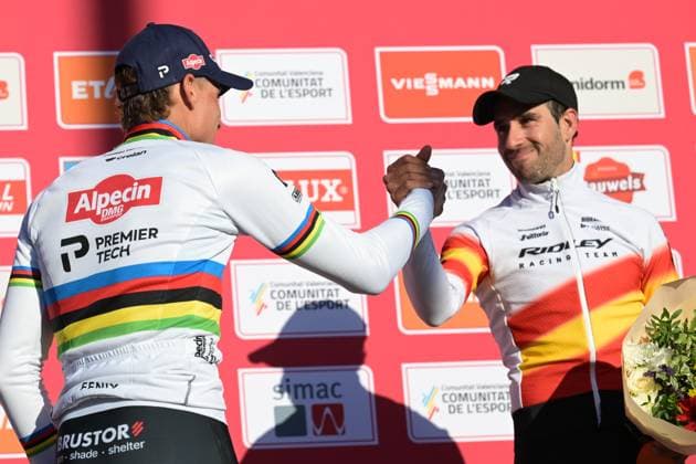 Dutch Mathieu Van Der Poel and Spanish Felipe Orts Lloret pictured on the podium after the Men s Elite race at the cyclocross cycling event in Benidorm, Spain, Sunday 18 January 2026, stage 10 12 in the UCI World Cup competition. DAVIDxPINTENS  x156812658x