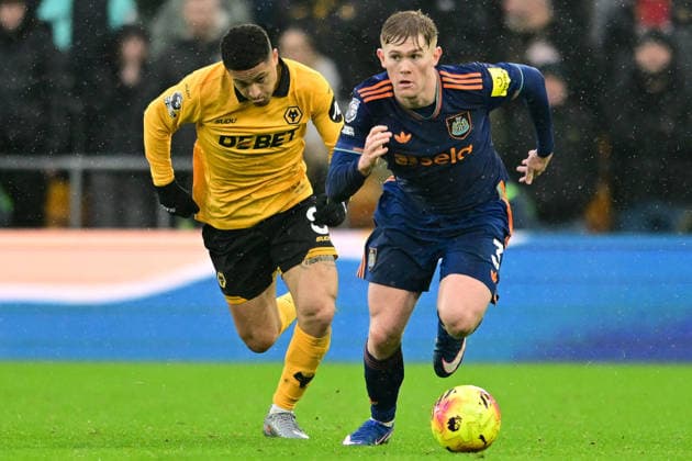 Wolverhampton Wanderers v Newcastle United, Premier League Newcastle United defender Lewis Hall (3) under pressure from Wolverhampton Wanderers midfielder Joao Gomes (8) during the Premier League match between Wolverhampton Wanderers and Newcastle United at Molineux, Wolverhampton, UK on 18 January 2026. Wolverhampton Molineux West Midlands UK Editorial use only DataCo restrictions apply See www.football-dataco.com , Copyright: xDennisxGoodwinx PSI-23590-0086