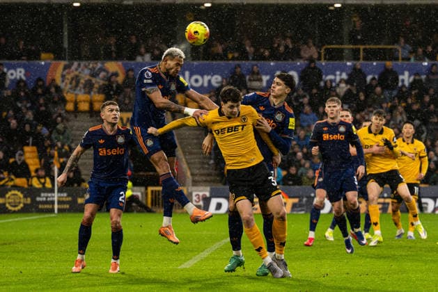 18th January 2026; Molineux Stadium, Wolverhampton, West Midlands, England; Premier League Football, Wolverhampton Wanderers versus Newcastle United; Joelinton of Newcastle United makes a defensive header from Hugo Bueno of Wolverhampton Wanderers  GodfreyxPitt Content restricted for UK based newspaper