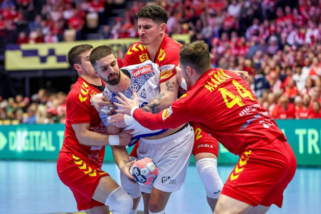 18 01 2026, Handball, Men s EHF EURO 2026, Portugal North Macedonia, Jyske Bank Boxing in Herning, Denmark, Preliminary Round Martim Mota Costa Portugal 79 is moored by Martin Velkovski North Macedonia 04 Marko Stojkovikj North Macedonia 42 Mihail Alarov North Macedonia 44 Denmark